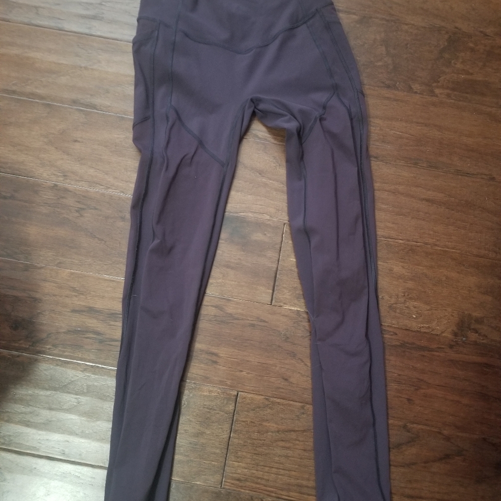 Lululemon leggings burgundy in color